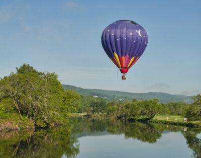 Hot Air Balloon over the Ottauquechee River in Quechee VT