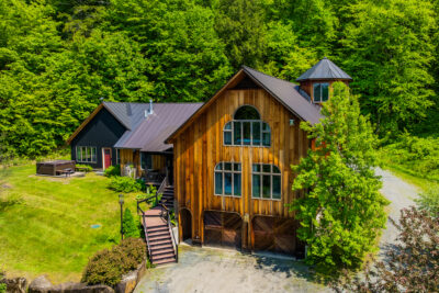 Exterior of All Seasons, Woodstock VT home for sale VT showing barn-style architecture
