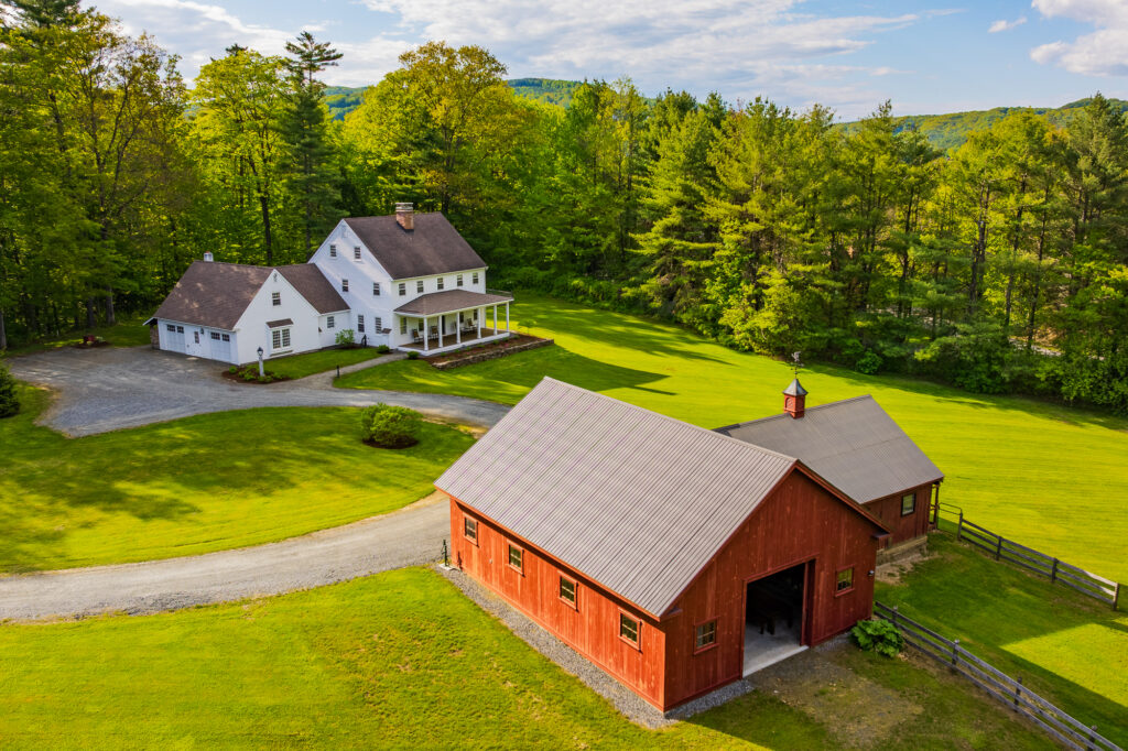 Distinguished Colonial home in Quechee, Vermont on over five acres of landscaped grounds