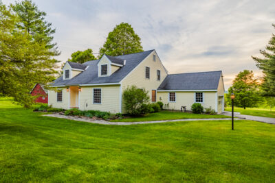 Barnard VT home for sale on the North Road with mountain views and 10 acres of pasture.