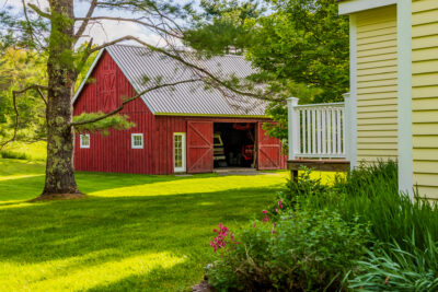 Large detached barn with ample space for animals, equipment, or workshop.